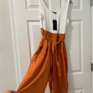 Shine star orange and white jumpsuit- no longer has tags - worn once !